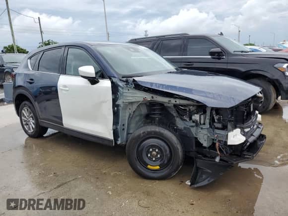 2023 Mazda CX-5 S Select with VIN JM3KFBBM4P0146132, listed as a Copart auction lot 80576965 with 36,345 mi miles and Clean title. Bid and sale history available at DreamBid. Image 4.