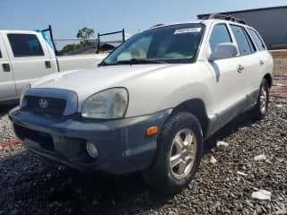 2004 Hyundai Santa Fe GLS z VIN KM8SC73E14U787020, wystawiony jako Copart lot #65078785 z przebiegiem 188 301 mil mil oraz Szkoda całkowita • Salvage title. Historia ofert i sprzedaży dostępna na DreamBid. Obrazek 1.