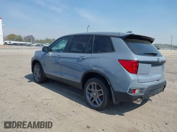 2022 Honda Passport EX-L with VIN 5FNYF8H51NB030262, listed as a IAAI auction lot 41911194 with 56,877 mi miles and . Bid and sale history available at DreamBid. Image 3.