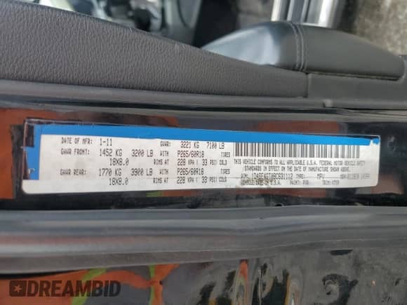 2011 Dodge Durango Crew z VIN 1D4SE4GT0BC631112, wystawiony jako Copart lot #70907055 z przebiegiem Nie podano mil oraz Szkoda całkowita • Salvage title. Historia ofert i sprzedaży dostępna na DreamBid. Obrazek 14.