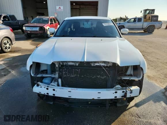 2010 Chrysler 300 S with VIN 2C3CA2CV4AH328326, listed as a Copart auction lot 71128315 with 122,788 mi miles and Salvage title. Bid and sale history available at DreamBid. Image 5.