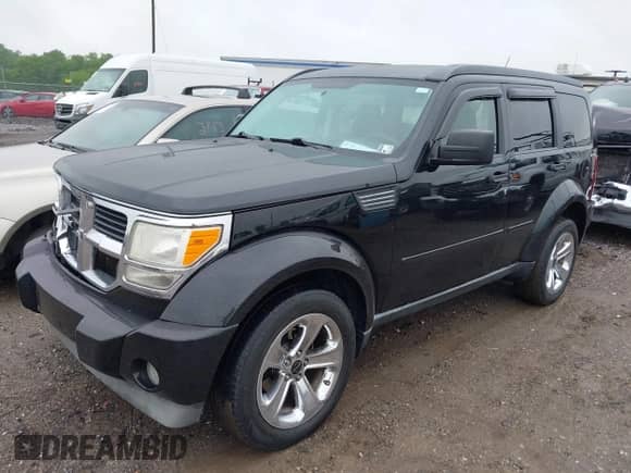 2009 Dodge Nitro SLT with VIN 1D8GU58K69W549915, listed as a IAAI auction lot 42268231 with 152,646 mi miles and . Bid and sale history available at DreamBid. Image 2.