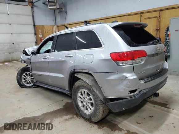 2018 Jeep Grand Cherokee Laredo E with VIN 1C4RJFAG3JC184711, listed as a Copart auction lot 69828195 with Not provided miles and Salvage title. Bid and sale history available at DreamBid. Image 2.