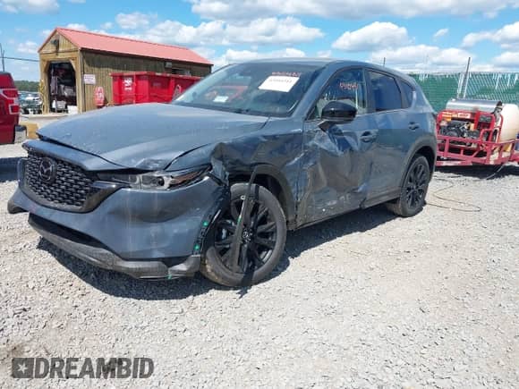 2025 Mazda CX-5 S Carbon Edition z VIN JM3KFBCM9S0704712, wystawiony jako IAAI lot #43104311 z przebiegiem 3 mil mil oraz . Historia ofert i sprzedaży dostępna na DreamBid. Obrazek 20.