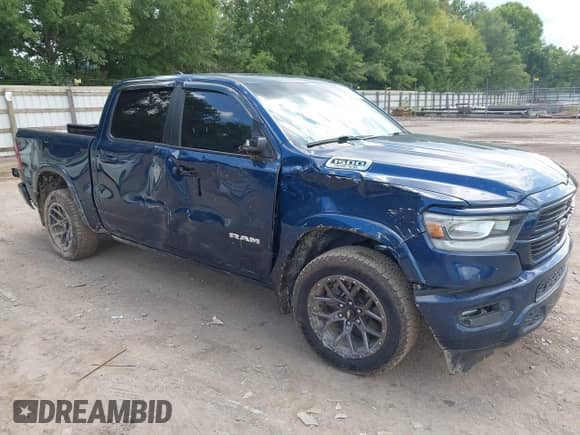 2020 Ram 1500 Laramie z VIN 1C6SRFJT4LN307504, wystawiony jako IAAI lot #42882754 z przebiegiem 100 563 mil mil oraz . Historia ofert i sprzedaży dostępna na DreamBid. Obrazek 6.