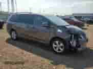 2014 Toyota Sienna LE AAS with VIN 5TDKK3DC7ES496377, listed as a Copart auction lot 80090825 with 129,053 mi miles and Salvage title. Bid and sale history available at DreamBid. Image 4.