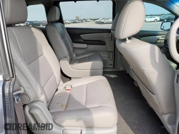 2013 Honda Odyssey EX-L z VIN 5FNRL5H66DB023178, wystawiony jako Copart lot #71291035 z przebiegiem 200 364 mil mil oraz Szkoda całkowita • Salvage title. Historia ofert i sprzedaży dostępna na DreamBid. Obrazek 11.