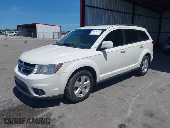 2012 Dodge Journey SXT z VIN 3C4PDCBB9CT394155, wystawiony jako IAAI lot #42570737 z przebiegiem 166 037 mil mil oraz . Historia ofert i sprzedaży dostępna na DreamBid. Obrazek 2.