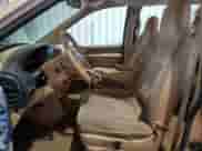 1999 Dodge Caravan SE with VIN 1B4GP44G1XB867914, listed as a Copart auction lot 67830785 with 141,875 mi miles and Salvage title. Bid and sale history available at DreamBid. Image 7.