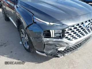 2021 Hyundai Santa Fe SEL z VIN 5NMS3DAJ0MH345114, wystawiony jako IAAI lot #43343253 z przebiegiem 52 092 mil mil oraz . Historia ofert i sprzedaży dostępna na DreamBid. Obrazek 6.