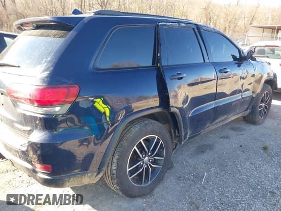 2018 Jeep Grand Cherokee Trailhawk z VIN 1C4RJFLG2JC399218, wystawiony jako IAAI lot #41650359 z przebiegiem Nie podano mil oraz . Historia ofert i sprzedaży dostępna na DreamBid. Obrazek 4.
