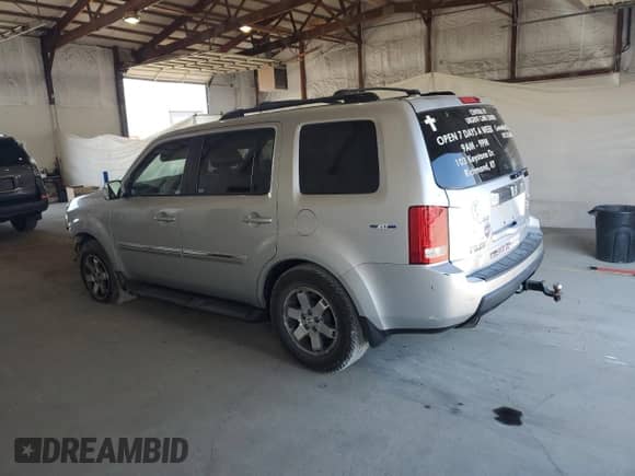 2009 Honda Pilot Touring с VIN 5FNYF48929B002908, выставлен на аукционе Copart как лот 81255035 с пробегом Не указан миль и Списание • Salvage title. История ставок и продаж доступна на DreamBid. Изображение 2.