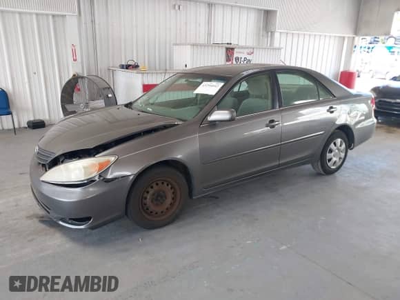2003 Toyota Camry LE with VIN JTDBE32K630154792, listed as a IAAI auction lot 43294042 with 123,134 mi miles and . Bid and sale history available at DreamBid. Image 17.