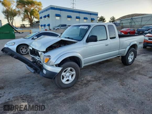 2003 Toyota Tacoma с VIN 5TEWN72NX3Z169900, выставлен на аукционе Copart как лот 80575545 с пробегом Не указан миль и Списание • Salvage title. История ставок и продаж доступна на DreamBid. Изображение 1.