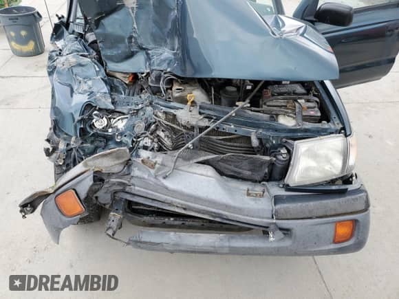 1998 Toyota Tacoma z VIN 4TAPM62N0WZ025379, wystawiony jako Copart lot #51533085 z przebiegiem 127 881 mil mil oraz Szkoda całkowita • Salvage title. Historia ofert i sprzedaży dostępna na DreamBid. Obrazek 12.