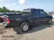 2003 Dodge Dakota Sport with VIN 1D7HG38XX3S334391, listed as a Copart auction lot 66194715 with 100,939 mi miles and Salvage title. Bid and sale history available at DreamBid. Image 3.