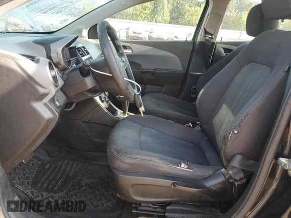 2014 Chevrolet Sonic LT с VIN 1G1JC5SH8E4124828, выставлен на аукционе Copart как лот 80097865 с пробегом 162 418 миль миль и Списание • Salvage title. История ставок и продаж доступна на DreamBid. Изображение 7.