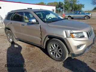 2014 Jeep Grand Cherokee Limited z VIN 1C4RJFBG0EC379735, wystawiony jako IAAI lot #43388970 z przebiegiem 211 184 mil mil oraz . Historia ofert i sprzedaży dostępna na DreamBid. Obrazek 1.