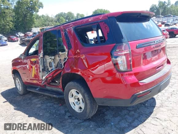 2023 Chevrolet Tahoe RST with VIN 1GNSCRKD9PR557300, listed as a IAAI auction lot 43087991 with 46,594 mi miles and . Bid and sale history available at DreamBid. Image 3.