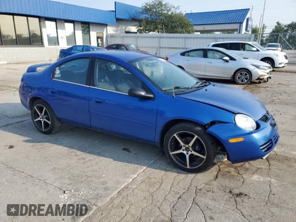 2004 Dodge Neon SXT with VIN 1B3ES56CX4D645799, listed as a Copart auction lot 67028335 with 176,412 mi miles and Salvage title. Bid and sale history available at DreamBid. Image 4.