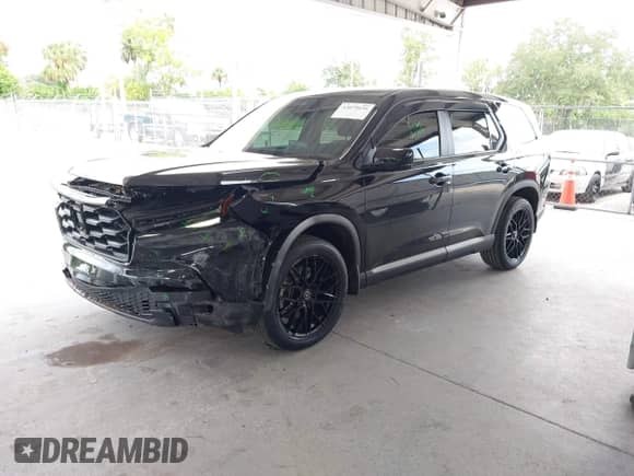 2024 Honda Pilot EX-L with VIN 5FNYG2H57RB008069, listed as a IAAI auction lot 43079636 with 32,575 mi miles and . Bid and sale history available at DreamBid. Image 2.