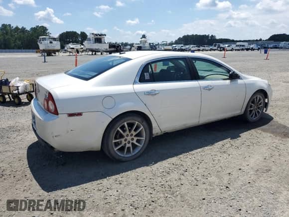 2010 Chevrolet Malibu LTZ with VIN 1G1ZE5E74AF325107, listed as a Copart auction lot 63506735 with 144,876 mi miles and Salvage title. Bid and sale history available at DreamBid. Image 3.