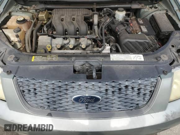 2005 Ford Freestyle SE with VIN 1FMZK01195GA40547, listed as a Copart auction lot 65790715 with 154,123 mi miles and Salvage title. Bid and sale history available at DreamBid. Image 12.