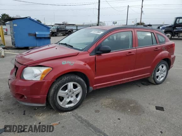 2009 Dodge Caliber SXT with VIN 1B3HB48CX9D108152, listed as a Copart auction lot 81012064 with 189,650 mi miles and Salvage title. Bid and sale history available at DreamBid. Image 1.