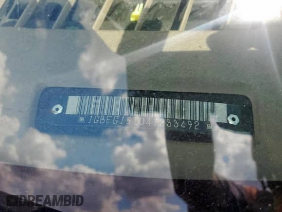 2004 Chevrolet Express Passenger with VIN 1GBFG15T041233492, listed as a Copart auction lot 82193815 with 219,338 mi miles and Salvage title. Bid and sale history available at DreamBid. Image 13.