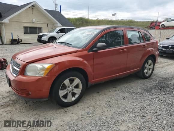 2010 Dodge Caliber Mainstreet with VIN 1B3CB3HA0AD565902, listed as a Copart auction lot 71371105 with 80,934 mi miles and Clean title. Bid and sale history available at DreamBid. Image 1.