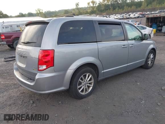 2019 Dodge Grand Caravan SXT with VIN 2C4RDGCG7KR750856, listed as a IAAI auction lot 43218902 with 118,798 mi miles and . Bid and sale history available at DreamBid. Image 4.