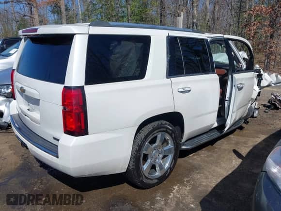 2017 Chevrolet Tahoe Premier with VIN 1GNSKCKC6HR224237, listed as a IAAI auction lot 41795532 with Not provided miles and . Bid and sale history available at DreamBid. Image 4.