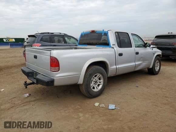 2001 Dodge Dakota Sport with VIN 1B7GL2AX21S214135, listed as a Copart auction lot 68122145 with 246,527 mi miles and Salvage title. Bid and sale history available at DreamBid. Image 3.