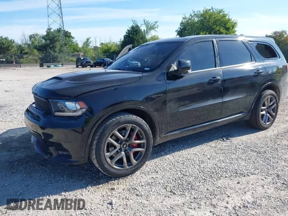 2020 Dodge Durango R/T with VIN 1C4SDJCT7LC257409, listed as a IAAI auction lot 43088237 with 93,258 mi miles and . Bid and sale history available at DreamBid. Image 2.