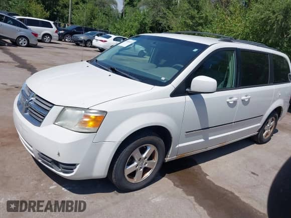 2009 Dodge Grand Caravan SXT with VIN 2D8HN54159R626944, listed as a IAAI auction lot 43056559 with 220,711 mi miles and . Bid and sale history available at DreamBid. Image 2.