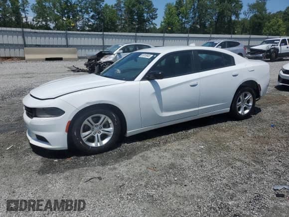 2023 Dodge Charger SXT with VIN 2C3CDXBG4PH523763, listed as a Copart auction lot 61919945 with 54,925 mi miles and Salvage title. Bid and sale history available at DreamBid. Image 1.