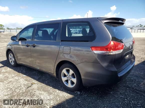 2012 Toyota Sienna with VIN 5TDZK3DC7CS249517, listed as a Copart auction lot 82555775 with 168,897 mi miles and Clean title. Bid and sale history available at DreamBid. Image 2.