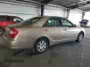 2002 Toyota Camry LE с VIN 4T1BE32K32U005811, выставлен на аукционе Copart как лот 70229945 с пробегом 209 472 миль миль и Чистый • Clean title. История ставок и продаж доступна на DreamBid. Изображение 3.