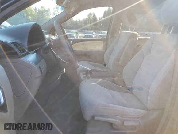 2008 Honda Odyssey LX with VIN 5FNRL38268B099135, listed as a Copart auction lot 84779895 with 238,385 mi miles and Salvage title. Bid and sale history available at DreamBid. Image 7.