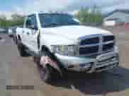 2004 Dodge 2500 SLT with VIN 3D7KU28D34G161515, listed as a IAAI auction lot 42183633 with 166,467 mi miles and . Bid and sale history available at DreamBid. Image 1.