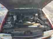 2001 Chevrolet Blazer LS z VIN 1GNCT18W51K123809, wystawiony jako Copart lot #86491294 z przebiegiem 211 514 mil mil oraz Szkoda całkowita • Salvage title. Historia ofert i sprzedaży dostępna na DreamBid. Obrazek 12.