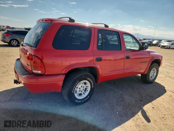 2000 Dodge Durango with VIN 1B4HS28Z9YF104374, listed as a Copart auction lot 82122685 with 190,441 mi miles and Salvage title. Bid and sale history available at DreamBid. Image 3.