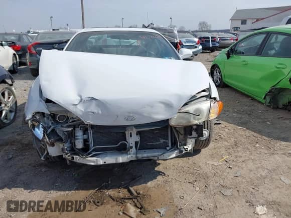 1998 Hyundai Tiburon z VIN KMHJG34F6WU115098, wystawiony jako IAAI lot #41718290 z przebiegiem 133 555 mil mil oraz . Historia ofert i sprzedaży dostępna na DreamBid. Obrazek 12.