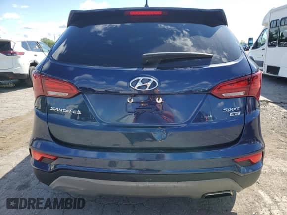 2018 Hyundai Santa Fe 2.4L z VIN 5XYZTDLB8JG546804, wystawiony jako Copart lot #70115275 z przebiegiem 141 974 mil mil oraz Czysty tytuł • Clean title. Historia ofert i sprzedaży dostępna na DreamBid. Obrazek 6.