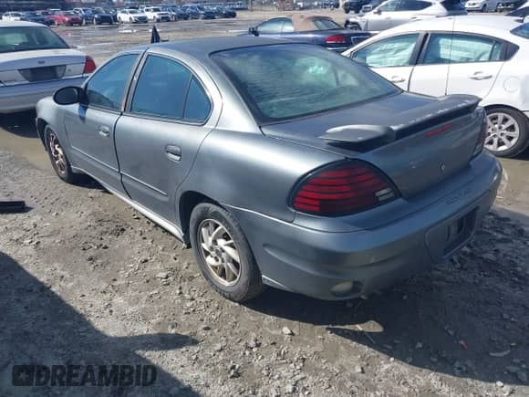 2004 Pontiac Grand Am SE1 with VIN 1G2NF52F04M513755, listed as a IAAI auction lot 41600613 with Not provided miles and . Bid and sale history available at DreamBid. Image 3.