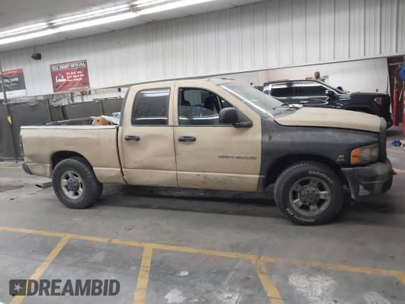 2003 Dodge 2500 ST z VIN 3D7KA286X3G753292, wystawiony jako IAAI lot #43271144 z przebiegiem Nie podano mil oraz . Historia ofert i sprzedaży dostępna na DreamBid. Obrazek 13.