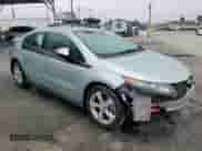 2012 Chevrolet Volt with VIN 1G1RB6E49CU108249, listed as a Copart auction lot 64499795 with 149,846 mi miles and Salvage title. Bid and sale history available at DreamBid. Image 4.