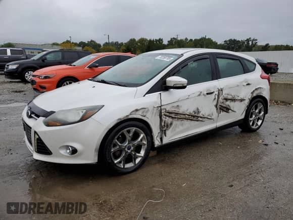 2014 Ford Focus Titanium with VIN 1FADP3N2XEL459394, listed as a Copart auction lot 70258785 with 262,909 mi miles and Non repairable. Bid and sale history available at DreamBid. Image 1.