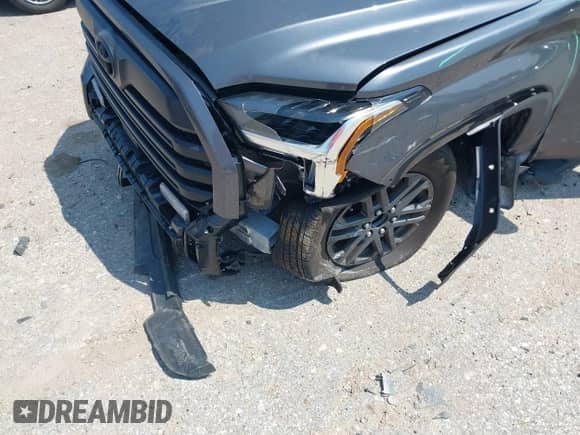 2025 Toyota Tundra SR with VIN 5TFLA5AB2SX048486, listed as a IAAI auction lot 43037169 with 4,902 mi miles and . Bid and sale history available at DreamBid. Image 6.