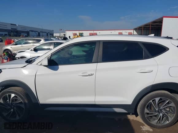 2020 Hyundai Tucson SEL with VIN KM8J33AL4LU163054, listed as a IAAI auction lot 43393686 with 70,141 mi miles and . Bid and sale history available at DreamBid. Image 14.